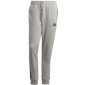 Spodnie adidas Essentials Tapered Cuff 3 Stripes M GK8889 Adidas