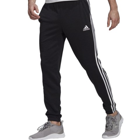 Spodnie adidas Essentials Tapered Elasticcuff 3 Stripes Pant M GK8829 Adidas