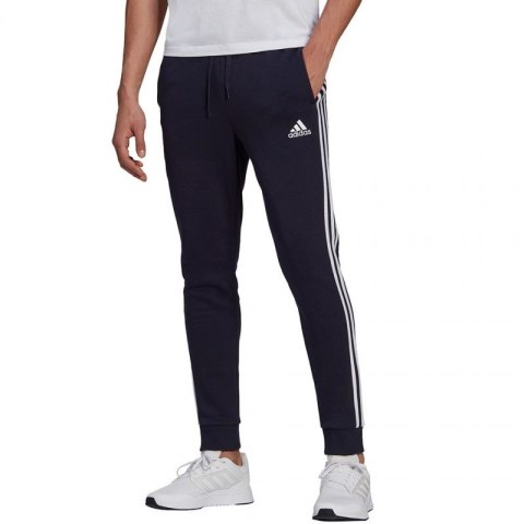 Spodnie adidas Essentials Fleece Tapered Cuff 3-Band M GK8823 Adidas
