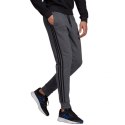 Spodnie adidas Essentials Tapered Cuff 3 Stripes M GK8826 Adidas
