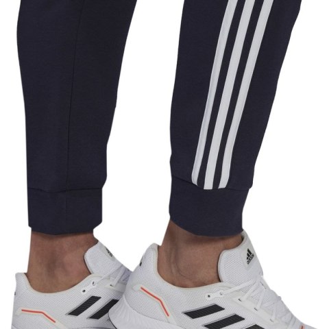 Spodnie adidas Essentials Colorblock Fleece M HK2884 Adidas